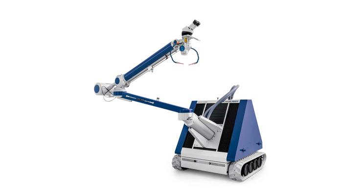 an ergonomic laser system which can be driven easily and fast to the work pieces and this with millimeter accuracy